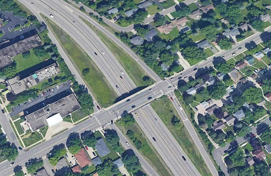 Aerial view of an compact intersection in an urban area.